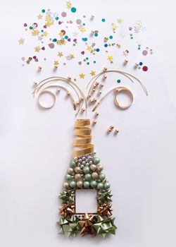 Opening of champagne bottle made from decorations 