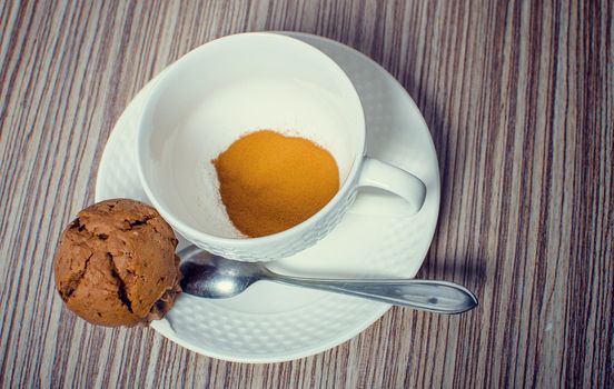 Chocolate muffin and coffee is ideal for a good breakfast.