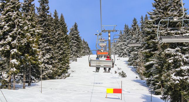 Transport by ski lift to the top of the slope.