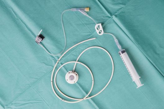 Port a catheter or central venous port insertion, puncture at chest wall to aorta artery  a medical device as silicone cartridges ,has flexible tube with needle and syringe.