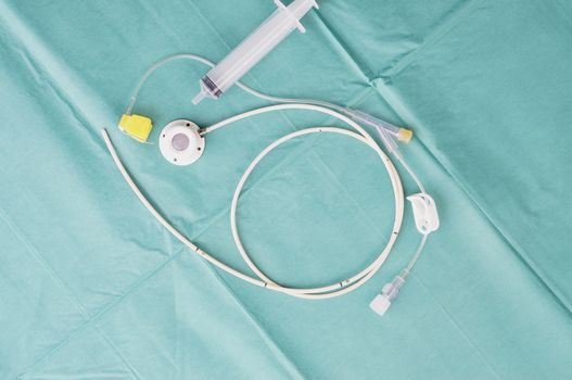 Port a catheter or central venous port insertion, puncture at chest wall to aorta artery  a medical device as silicone cartridges ,has flexible tube with syringe.                               