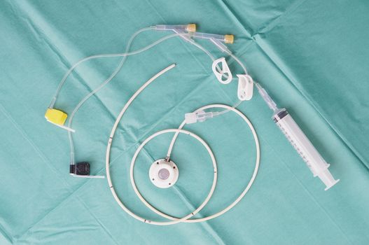 Port a catheter or central venous port insertion, puncture at chest wall to aorta artery  a medical device as silicone cartridges ,has flexible tube with syringe and needle.                              
