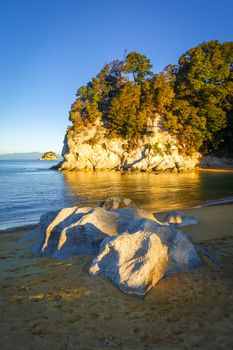 Creek and beach at sunset in Abel Tasman National Park. New Zealand