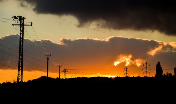 Sunset shot in front of a power line. 