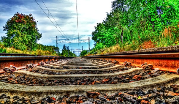 Abstract colorful tracks and landscape in photo.