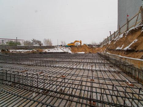 Framework for the concrete foundation of new building in russia