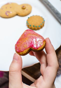 Cutting and baking Christmas gingerbread in Advent Time