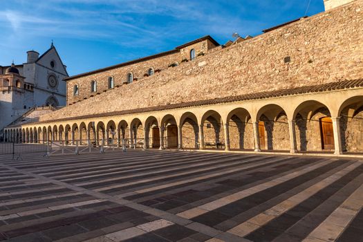 italy: colonnade of the square in front of the cathedral of Saint Francis