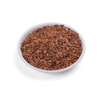 Pile of raw flax seeds isolated on white background. Healthy food.