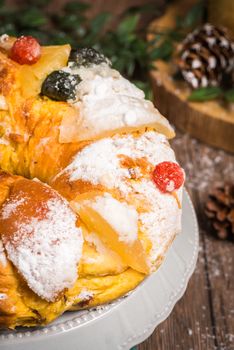 Bolo do Rei or King's Cake, Made for Christmas, Carnavale or Mardi Gras with Present Wrapping in Background