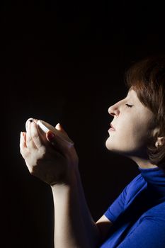 Portrait of a woman with a cup of fragrant coffee