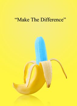 Blue banana on yellow background with Make the difference text. Business concept.