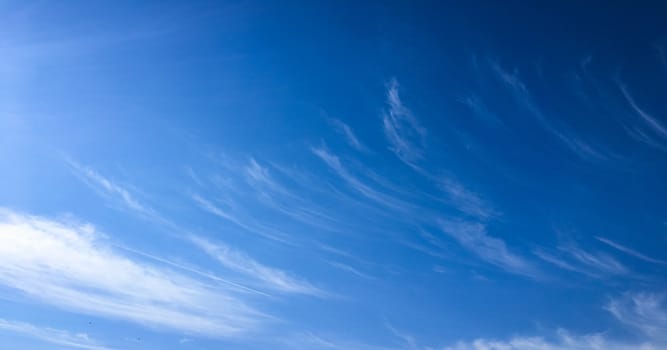 Beautiful blue sky with clouds background. Sky with clouds weather nature cloud blue. Blue sky with clouds and sun