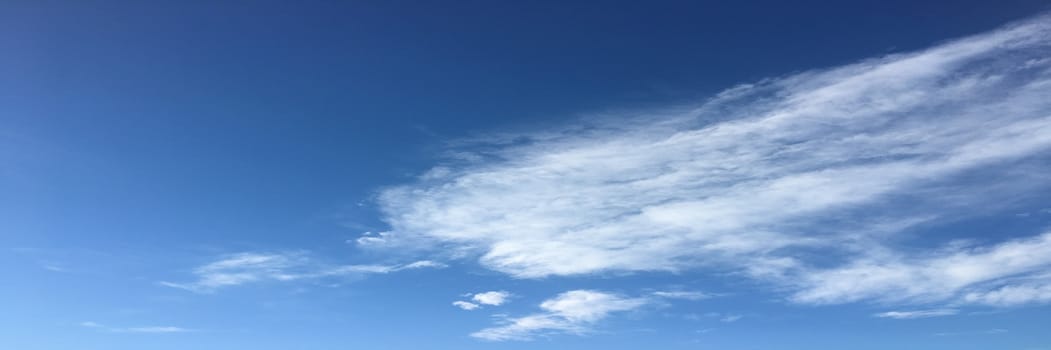 Beautiful blue sky with clouds background. Sky with clouds weather nature cloud blue. Blue sky with clouds and sun