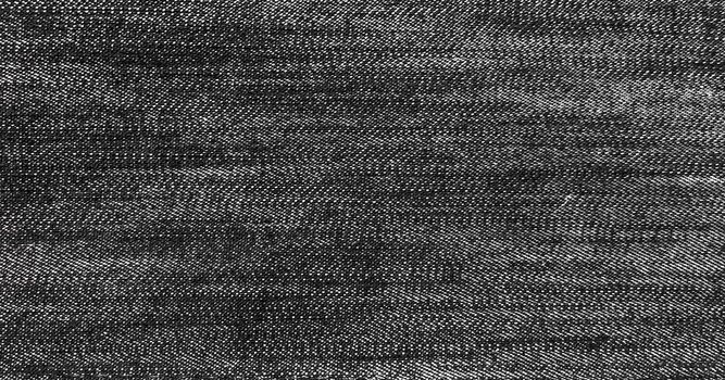 Denim jeans background, Jeans texture, denim fabric. Black background