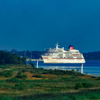 White cruise liner in Riga city. Tour travel and spa services