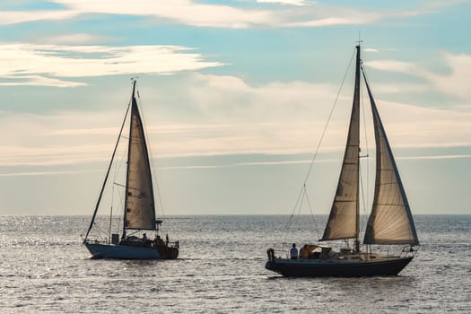 A fiew sailboats are traveling in Baltic sea. Summer journey