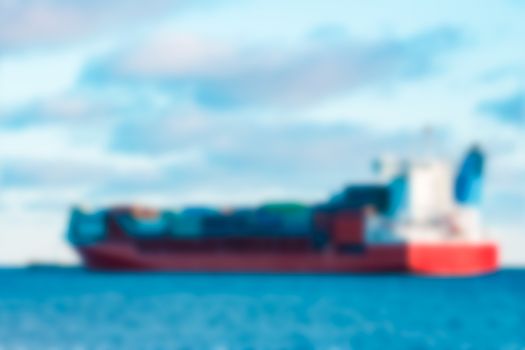 Cargo ship - soft lens bokeh image. Defocused background