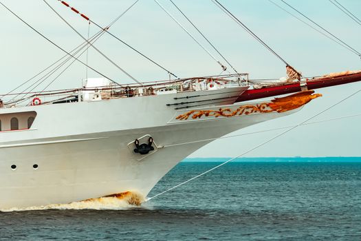 Big white sailing ship with three mast moving to the Riga port