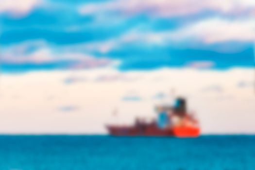 Cargo ship - soft lens bokeh image. Defocused background