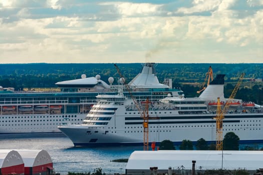 Two cruise liners in Riga. Tour travel and spa services