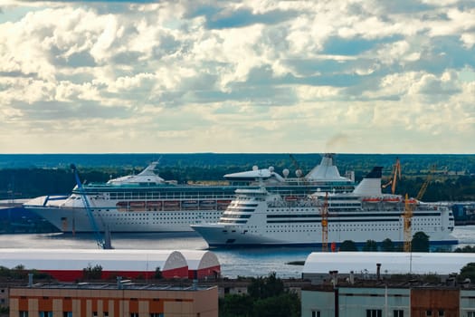 Two cruise liners in Riga. Tour travel and spa services