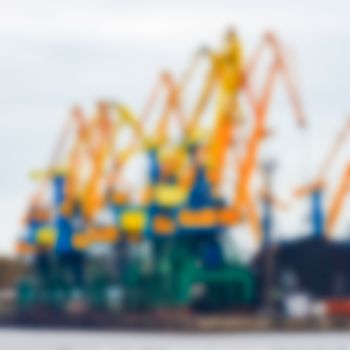 Portal cargo cranes - soft lens bokeh image. Defocused background