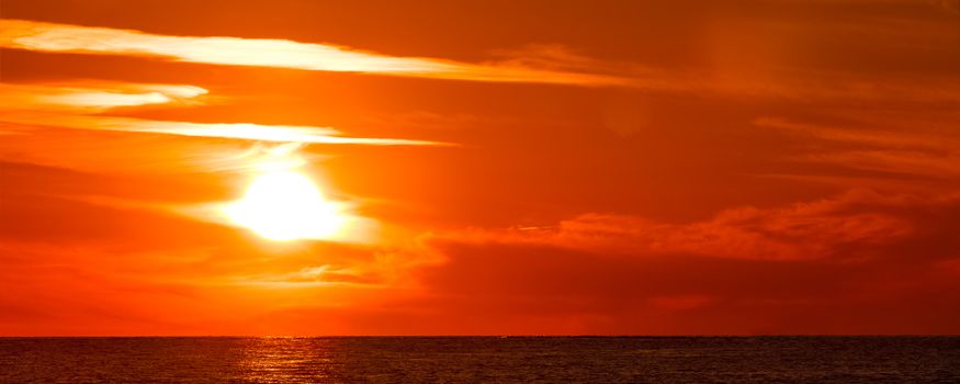 Hot and romantic sunset over the Baltic sea. Calm landscape