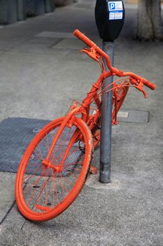 Parked orange bike in San Francisco