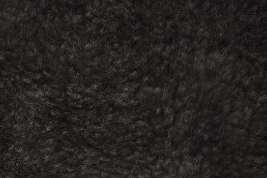black shaggy skin of an animal closeup texture, Fur Texture.