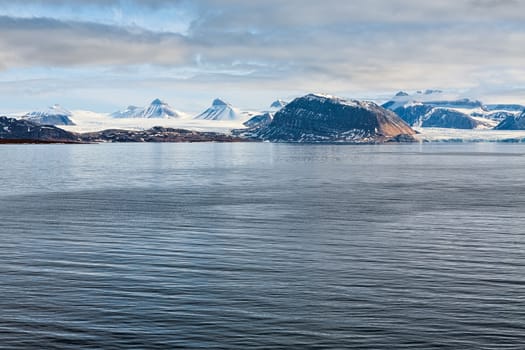 Mountains and glacier in Svalbard islands in a sunny day, Norway