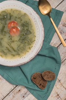 Caldo verde popular soup in Portuguese cuisine. traditional ingredients for caldo verde are potatoes, collard greens , olive oil and salt. Additionally garlic or onion may be added.