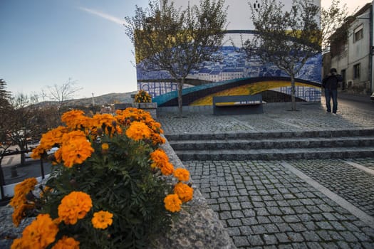 Monchique azulejo artwork on a small urban park.