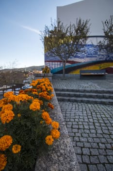 Monchique azulejo artwork on a small urban park.