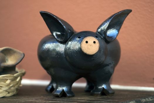 Beautiful souvenir black pig from Monchique village, Portugal.