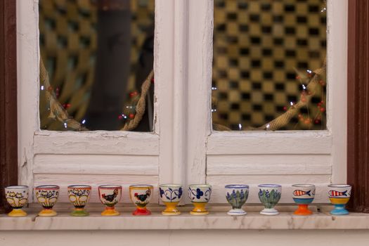 Colorful souvenir ceramic cups from Monchique village, Portugal.