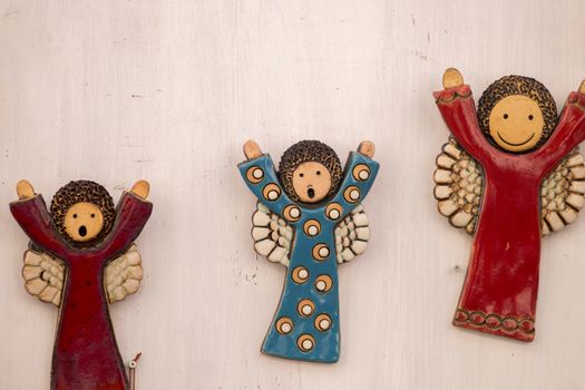 Ceramic souvenir angels from Monchique village, Portugal.