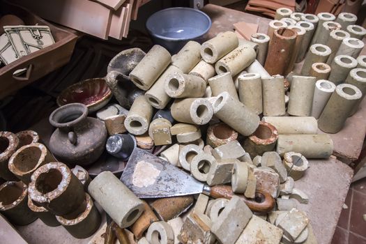 Close up view of souvenir ceramic workshop, with unfinished pieces.