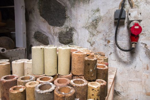 Close up view of souvenir ceramic workshop, with unfinished pieces.