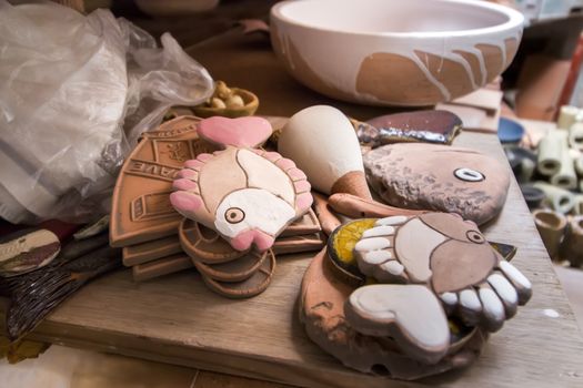 Close up view of souvenir ceramic workshop, with unfinished pieces.