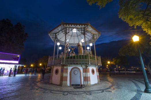Beautiful view of a christmas decorated gazebo in Faro city downtown, Portugal.
