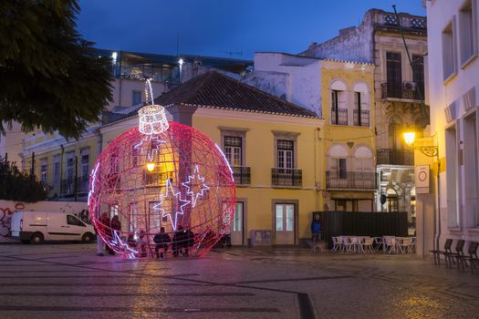 Beautiful view of a christmas ball in Faro city downtown, Portugal.