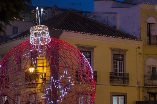 Beautiful view of a christmas ball in Faro city downtown, Portugal.