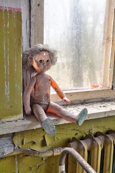 Dirty radioactive doll in kindergarten. Chernobyl, Ukraine