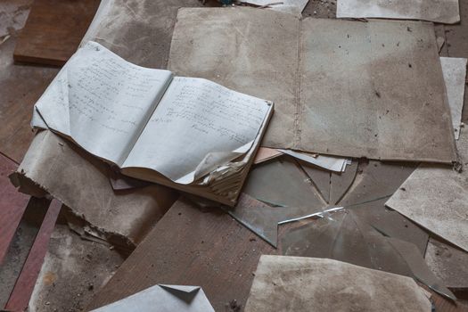 Abandoned notebooks and books in kindergarten. Chernobyl, Ukraine