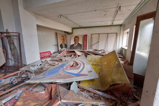 Room in abandoned theater in overgrown ghost city Pripyat near Chernobyl nuclear power plant in Ukraine.