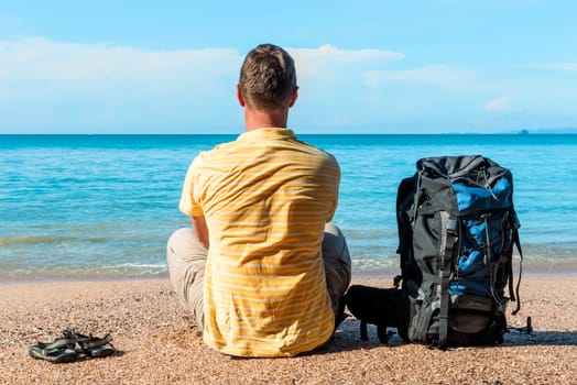 conceptual photo - tourist on vacation by the sea