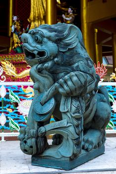 stone sculpture of traditional Asian cultures on a close-up street