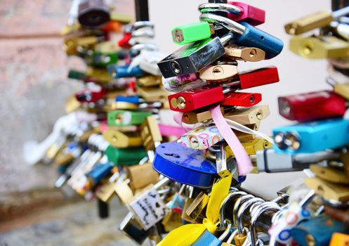 Closeup view of the locks of love on the fence.