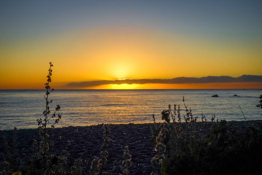 Sunset on Kaikoura beach, New Zealand southern island